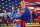 An actor playing Superman poses in front of models and murals at the Superman Celebration in Metropolis, Illinois. Photo courtesy of Superman Celebration. 